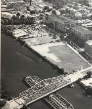 A black and white "before" image of the proposed park restoration site, showing an industrial area. 