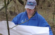 NOAA scientist Simeon Hahn surveys the site and provides input into the settlement process on cleanup and restoration actions.