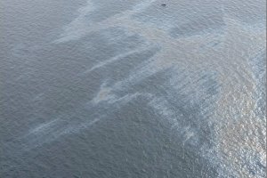Oil slick on water in the ocean. 